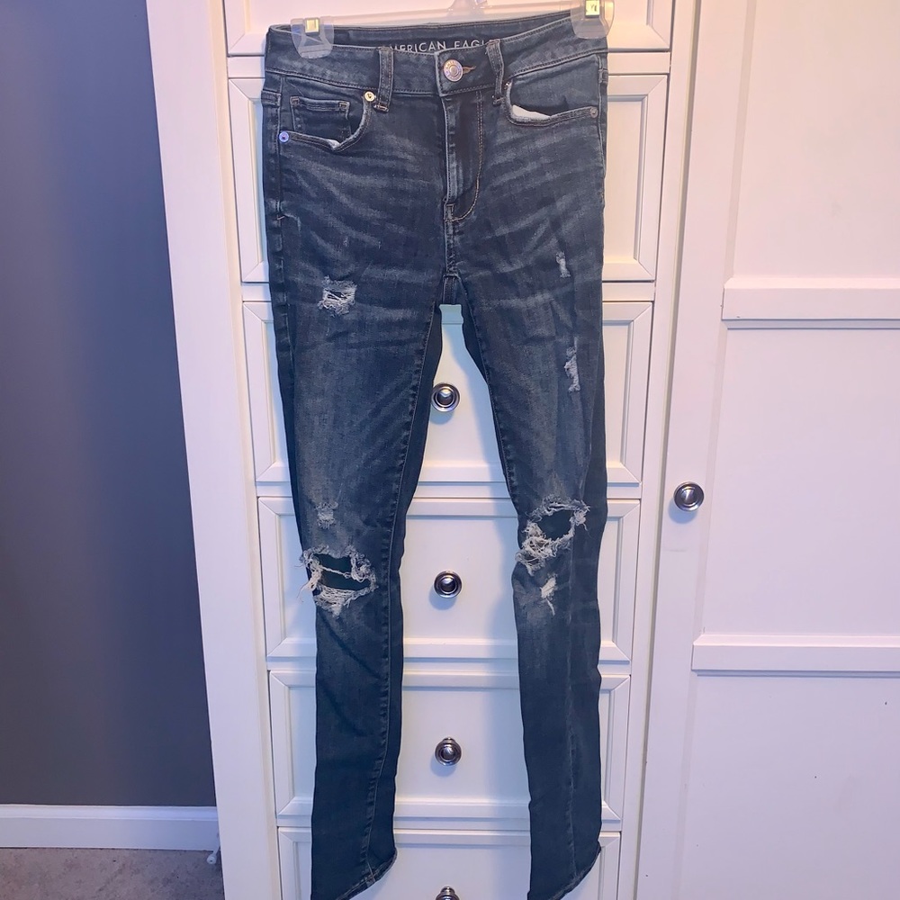“Super Stretch” Ripped Jeans